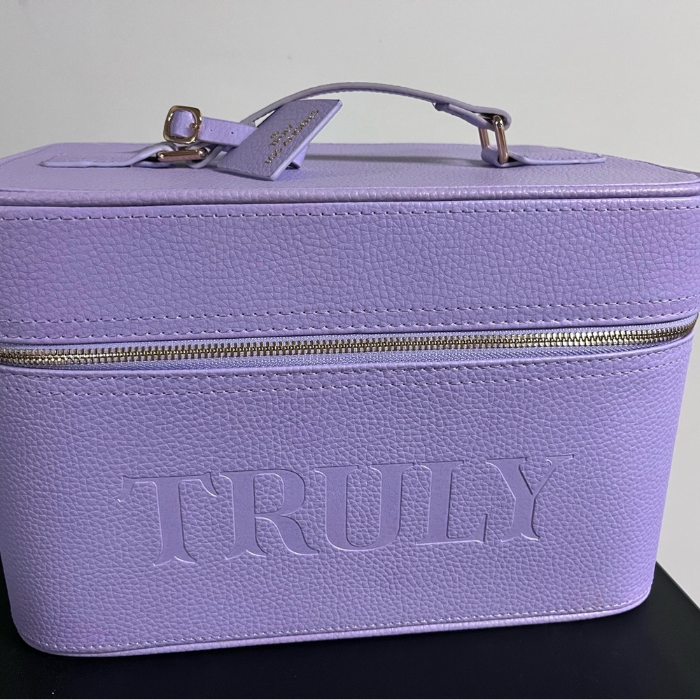 TRULY Purple Cosmetic Bag with Textured Finish and Top Handle.